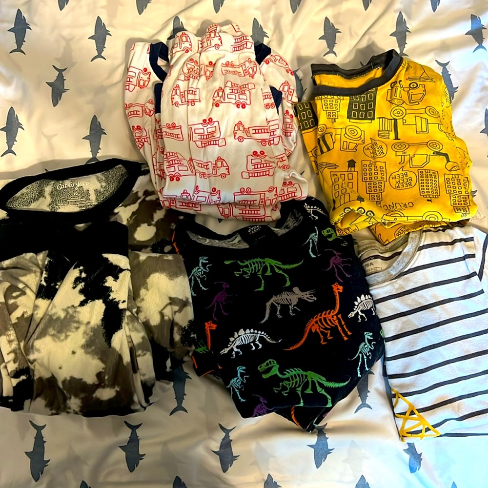 Five sets of kids Jammies. All in gently worn but good condition. Make an offer
